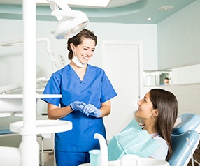 Patient in Tyler talking to dentist about dental crowns