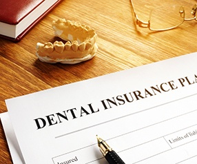 Patient in Tyler checking dental insurance for dental crowns