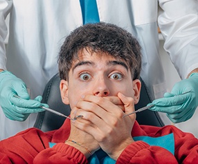 Man scared at the dentist